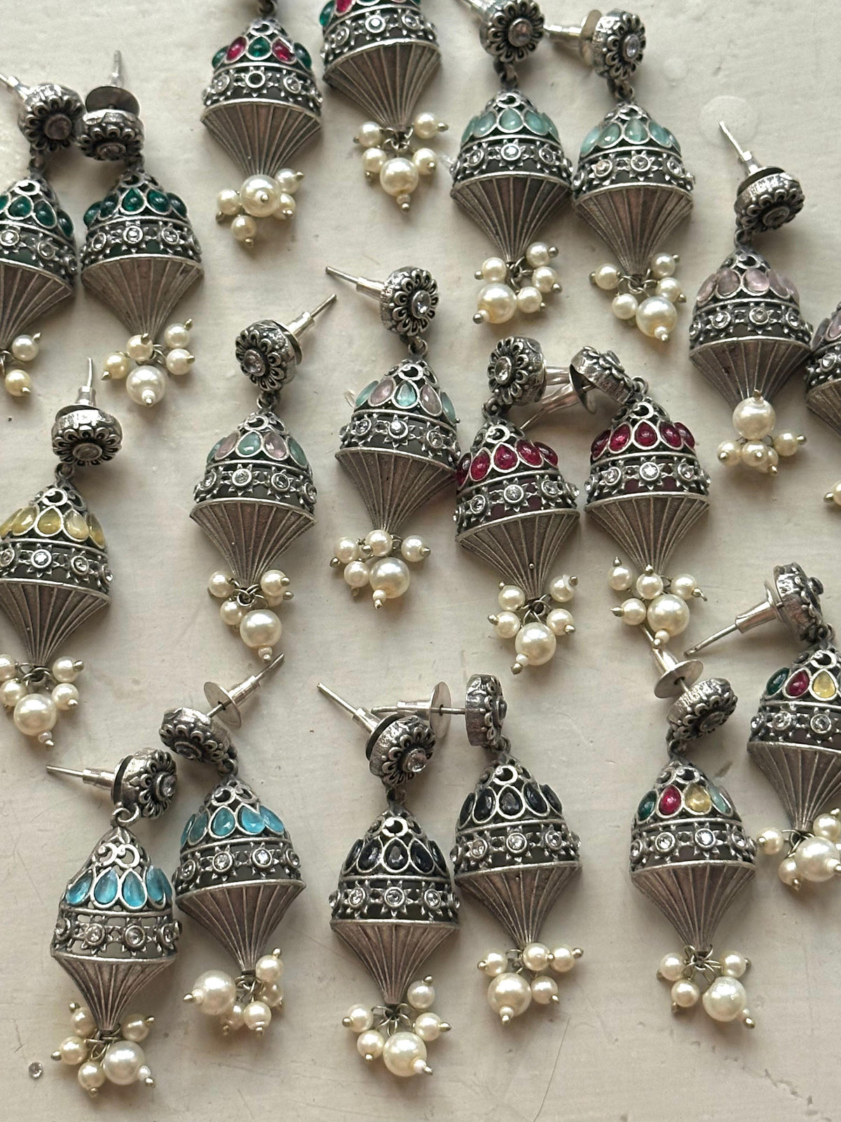 NIGAAR  EARRINGS [DARK GREEN STONES]