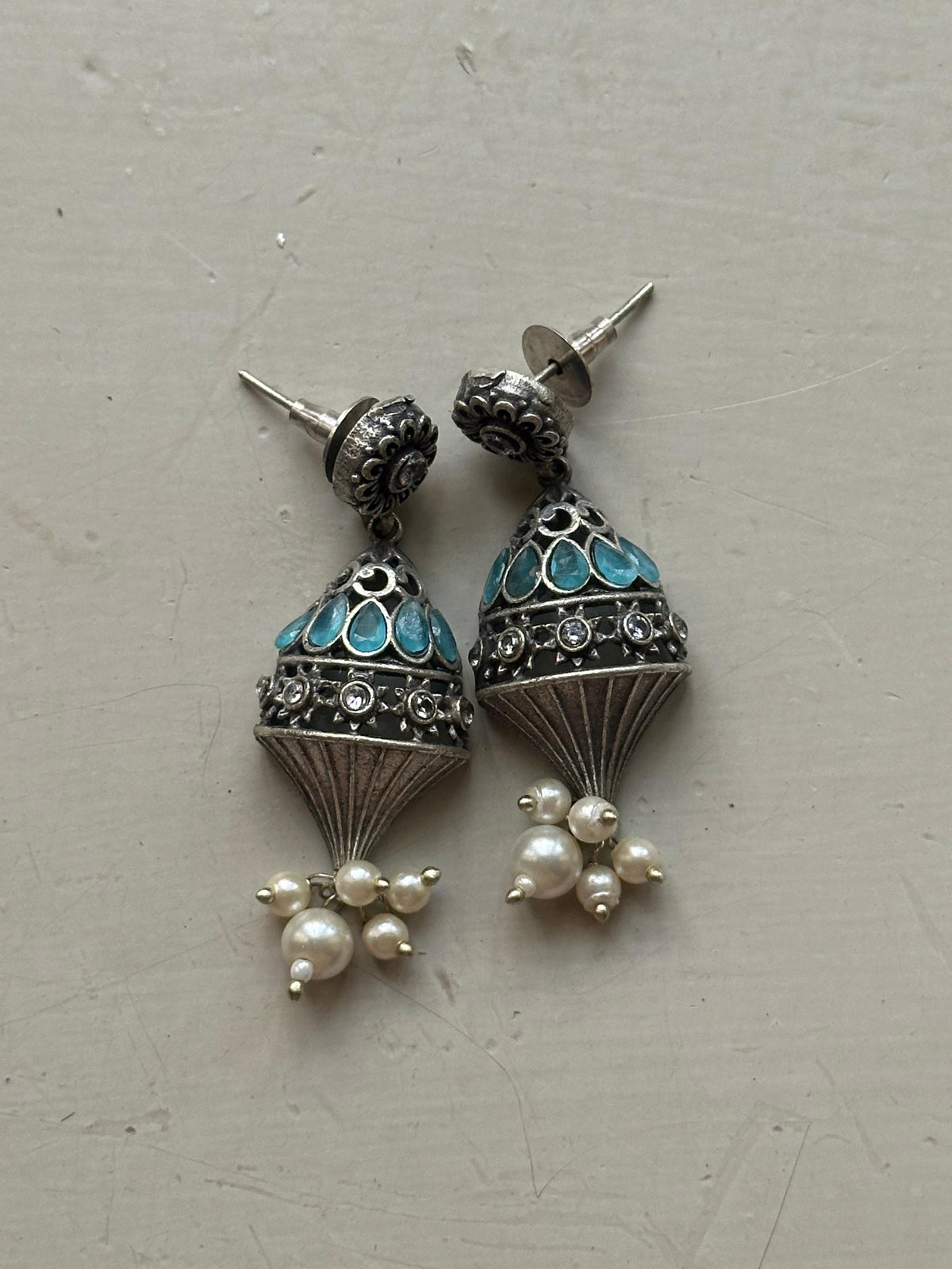 NIGAAR  EARRINGS [ICE BLUE STONES]